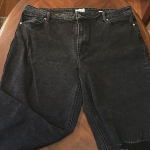 Black baggy light distressing on knee. New jeans never worn.